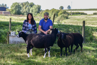 Tom and Lisa with sheep @Village Farm