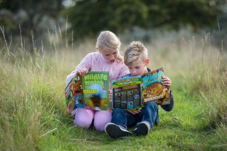 Children reading Wildlife Watch magazine 