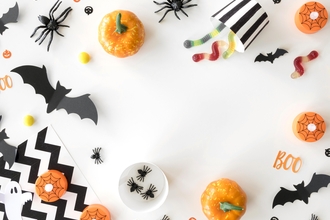 Mix of halloween decorations on white background