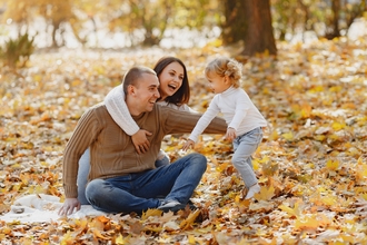 Family having fun in autumn park by Gustava Fring from pexels.com