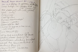Unlined writing journal open to see two pages, on the right hand side a hand written list in pencil about wildlife observed and on the right a sketch of yellow irises in pencil.