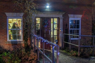 Christmas lights outside the front door to the Cambourne office 