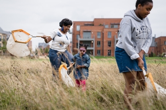 Family sweep netting at Trumpington Discovery Day 2018 by Paul Miller Kendrick-Grosvenor