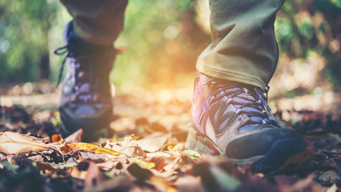 Walking boots on leaves