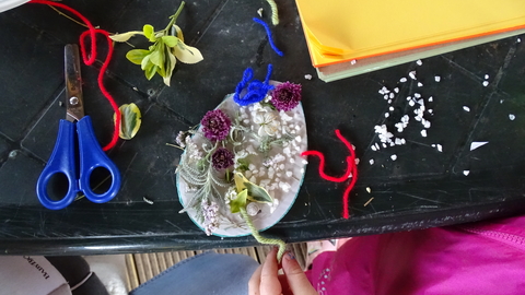 A card egg shape decorated with flowers