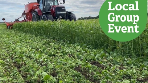 Harvesting machinery in a green field. Local Group Event icon overlaid.