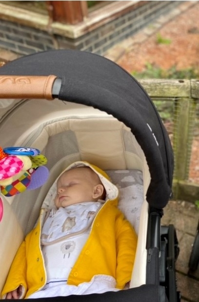 Arthur having a nap outdoors in his pram